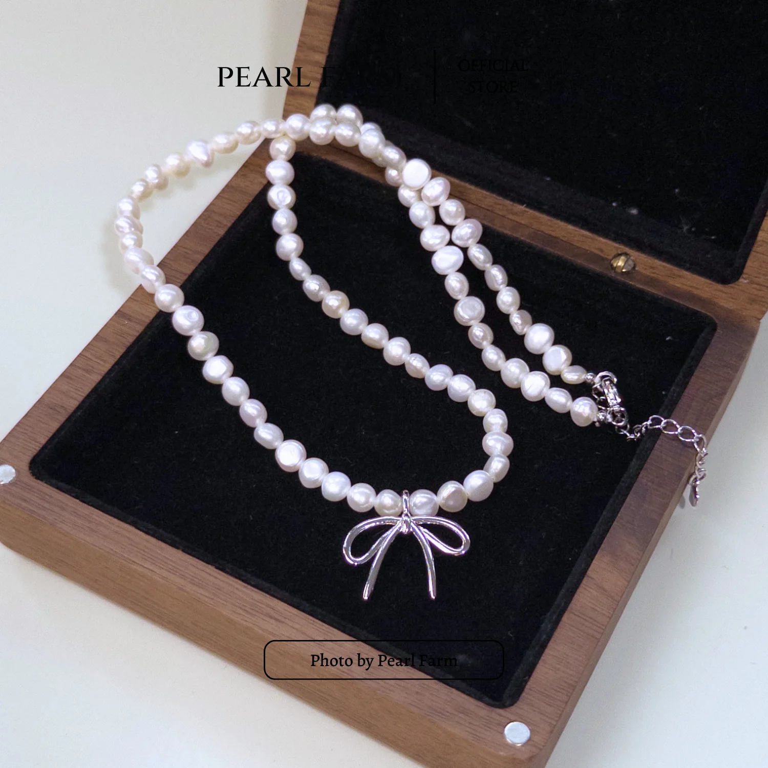 Chuỗi Cổ Ngọc Trai Xu Dị 5-6mm Mix Charm Nơ Titan - Ảnh 6